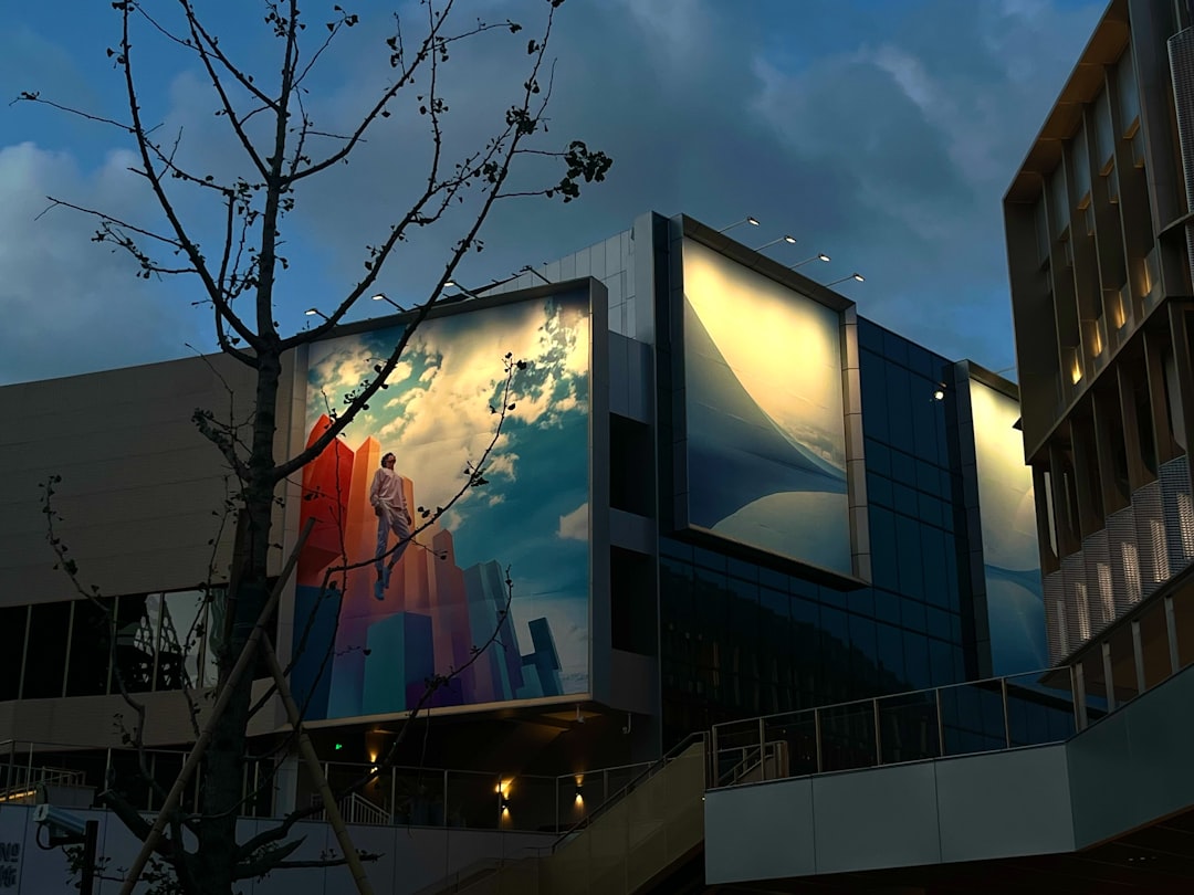 modern-building-with-large-illuminated-art-displays-p5dr7mfghpa